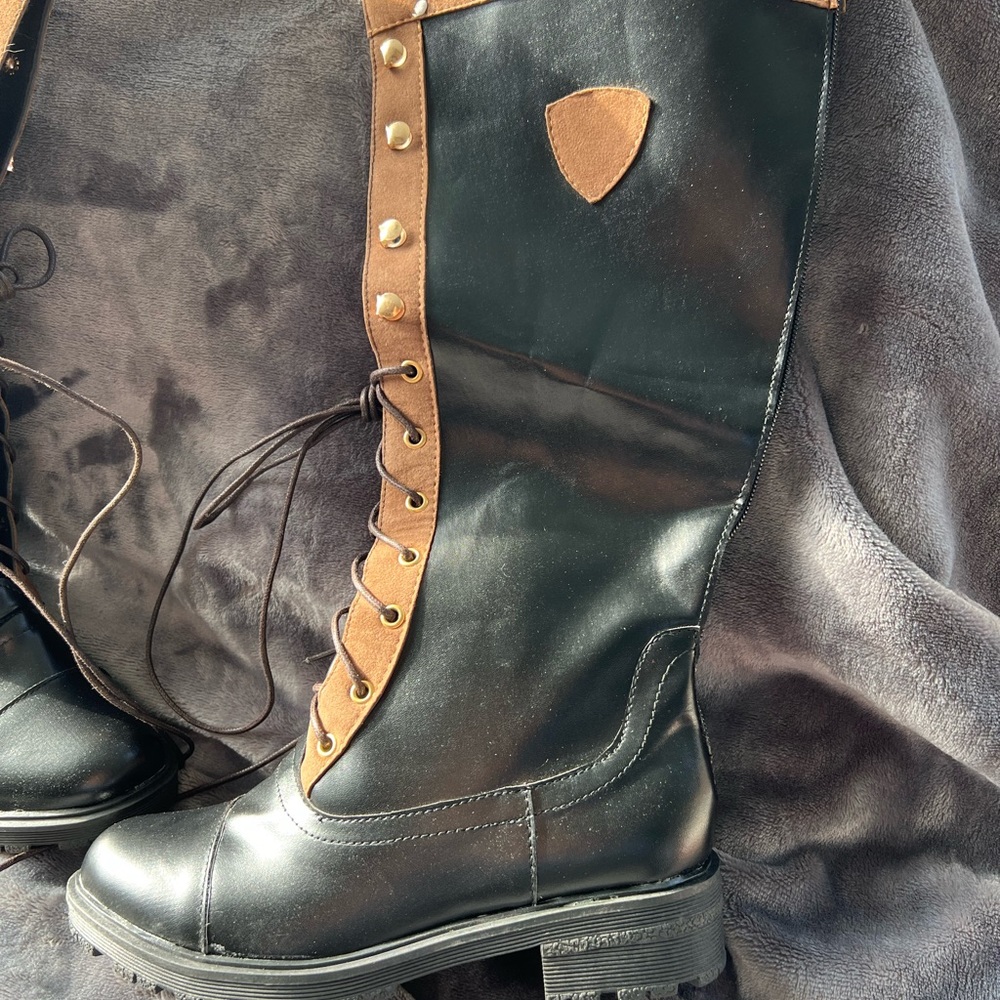 Waterproof and lined tall boots.Vegan leather.All man made Size 38Thick sole NEW